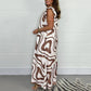 👗52% OFF NOW ! ✨Women's Ruffled Wide‑Leg Jumpsuit – Geometric Print V‑Neck One‑Piece Outfit