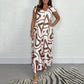 👗52% OFF NOW ! ✨Women's Ruffled Wide‑Leg Jumpsuit – Geometric Print V‑Neck One‑Piece Outfit